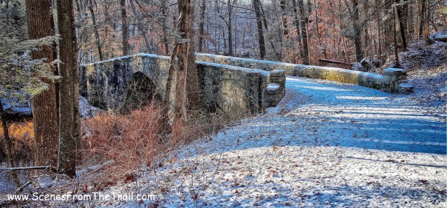 stone-faced triple-arch bridge