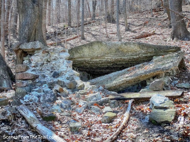 stone building with a concrete roof