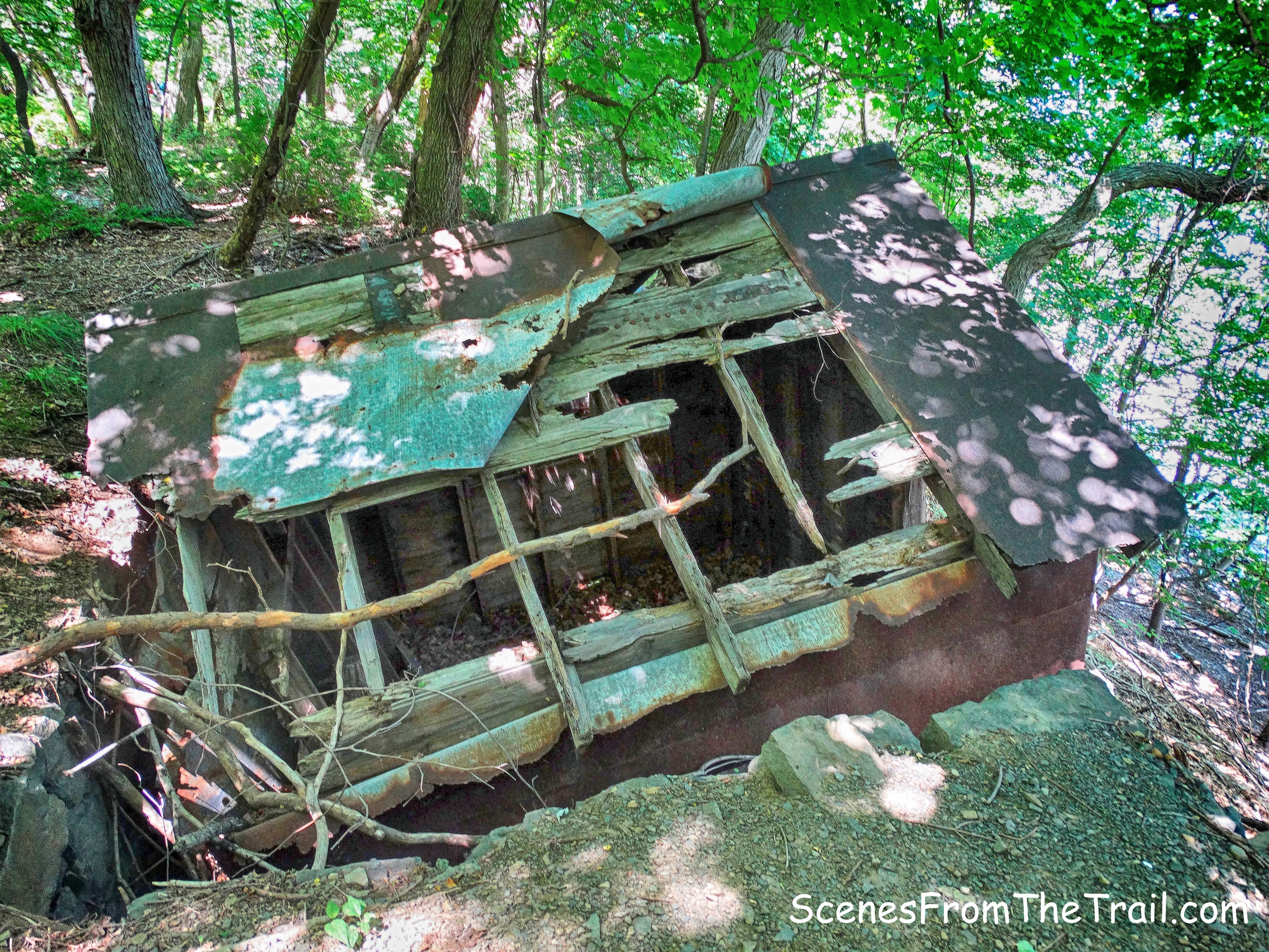 ruined metal shack