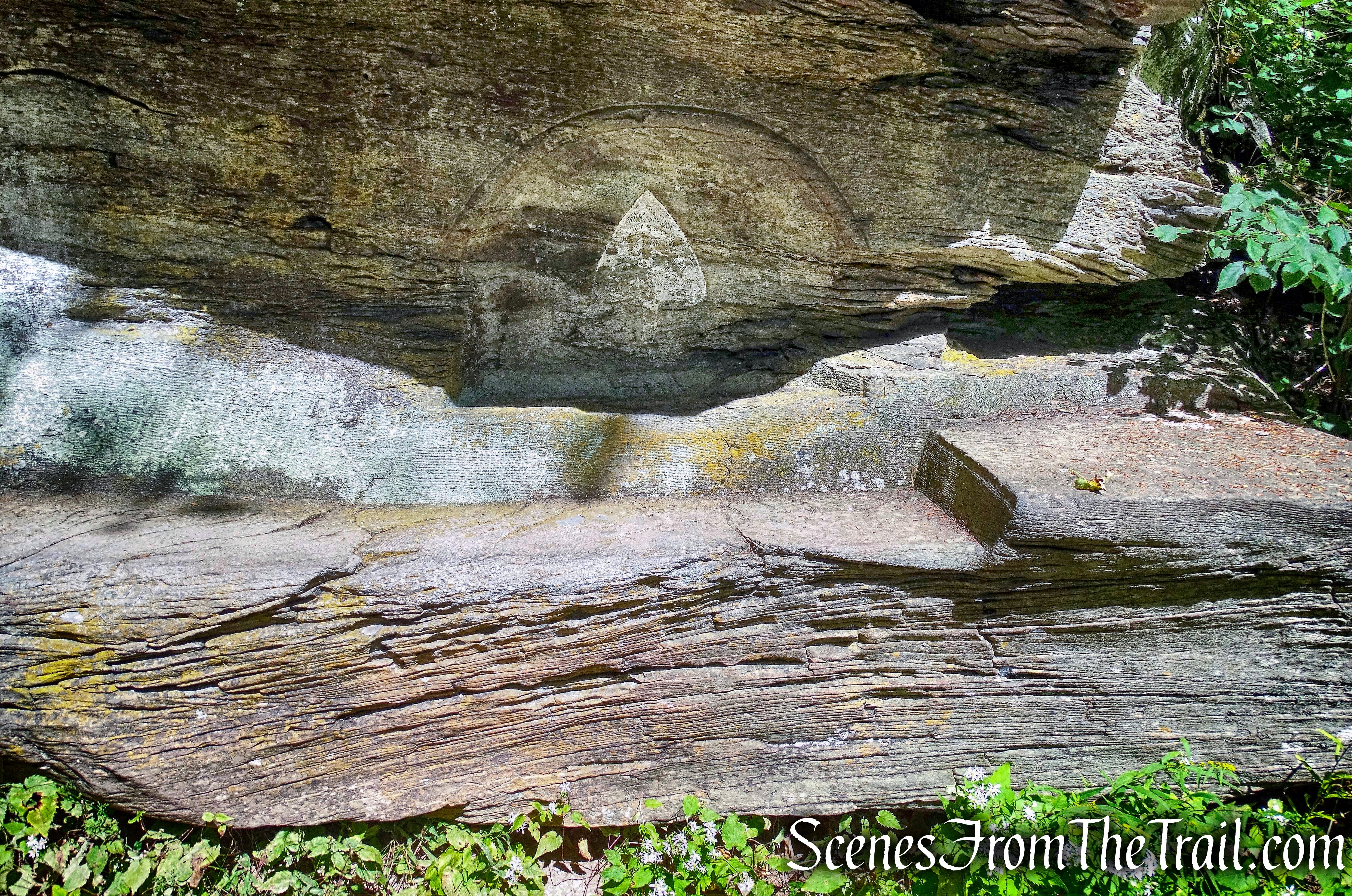 spade carved into the back rest