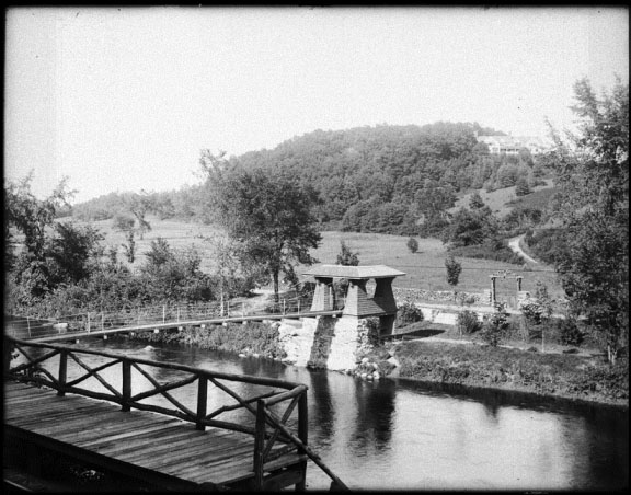 Railroad stop and suspension bridge - From the Collection of the Gunn Memorial Library and Museum