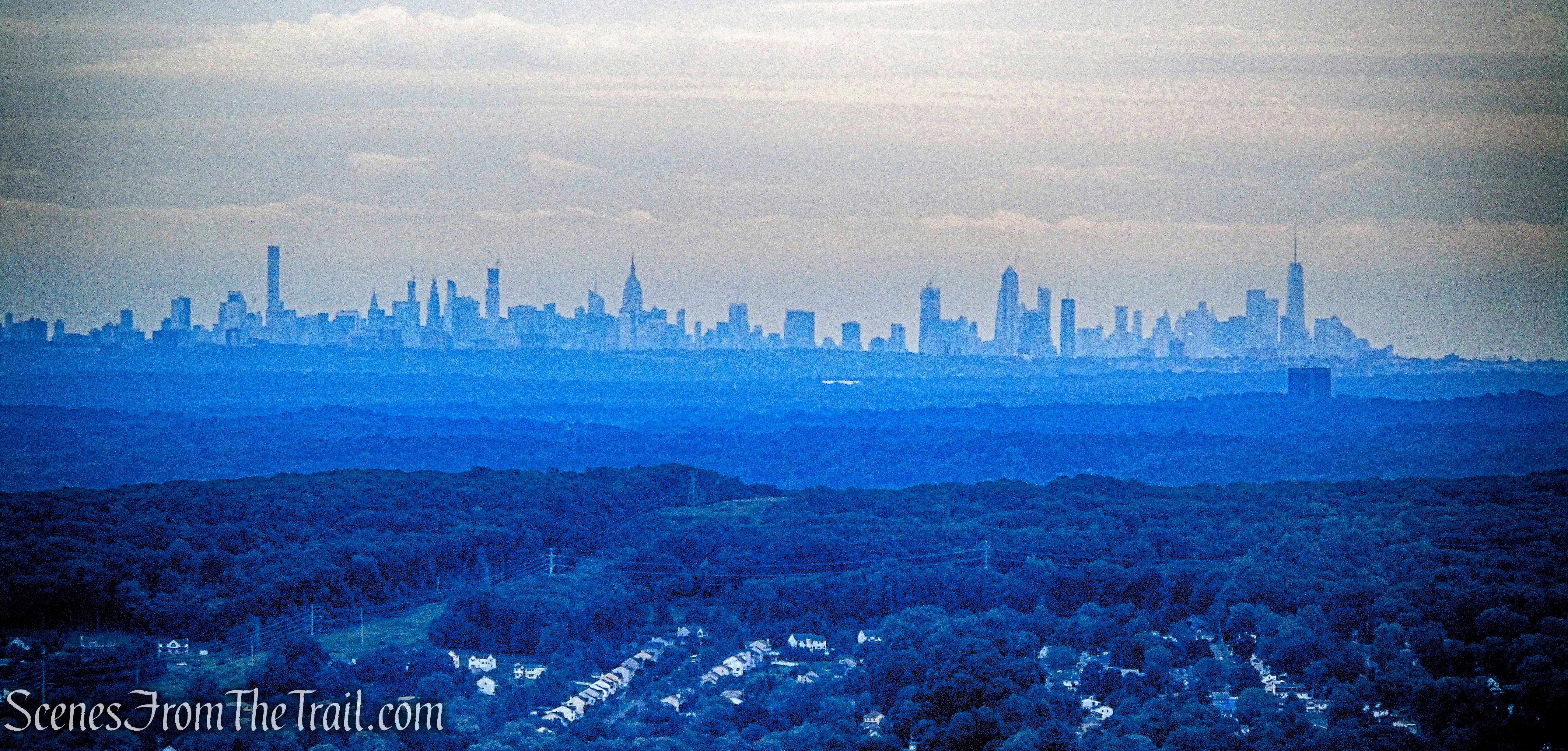 view of Manhattan skyline from the summit of The Timp