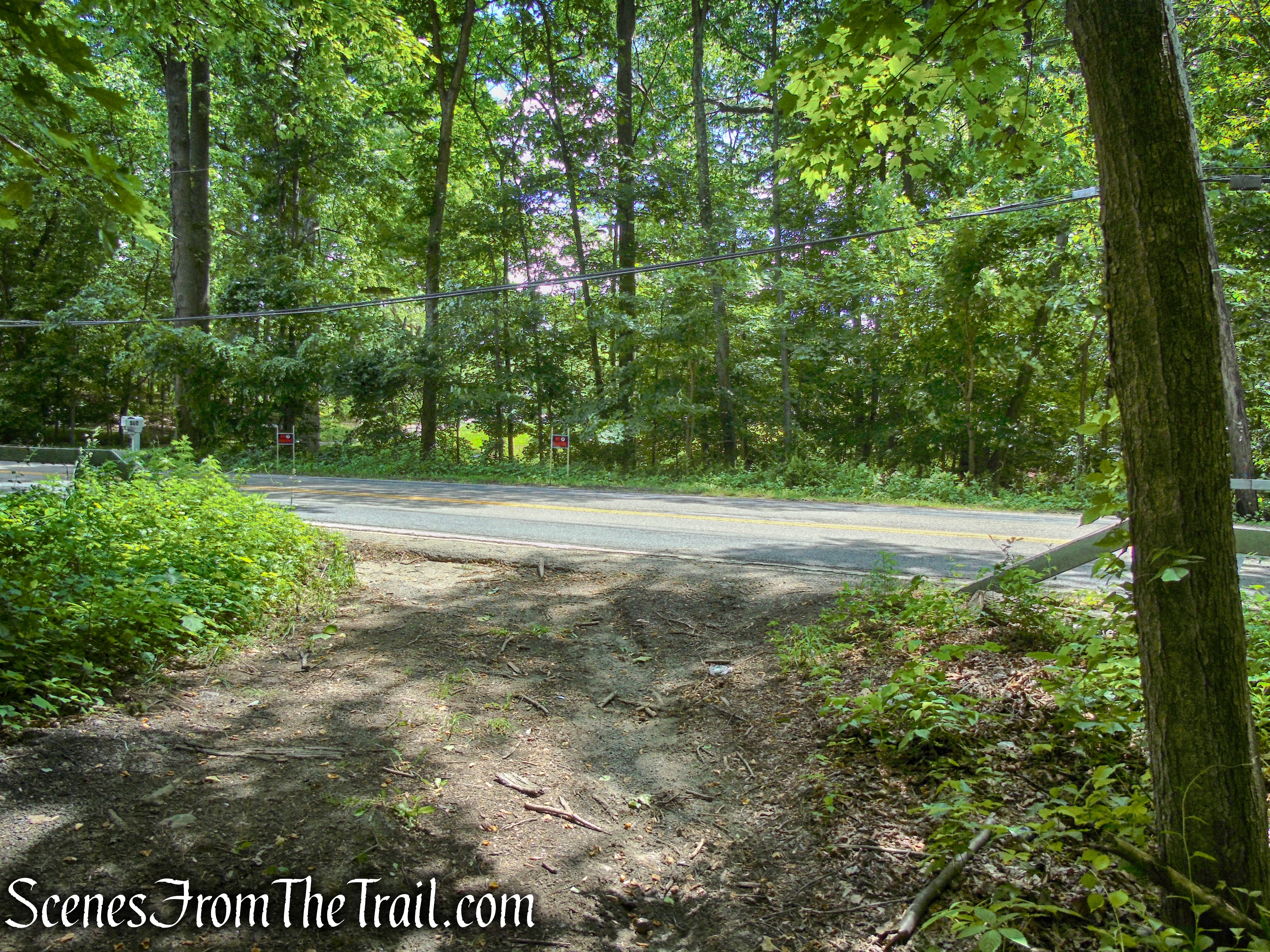 terminus of woods road at Route 129