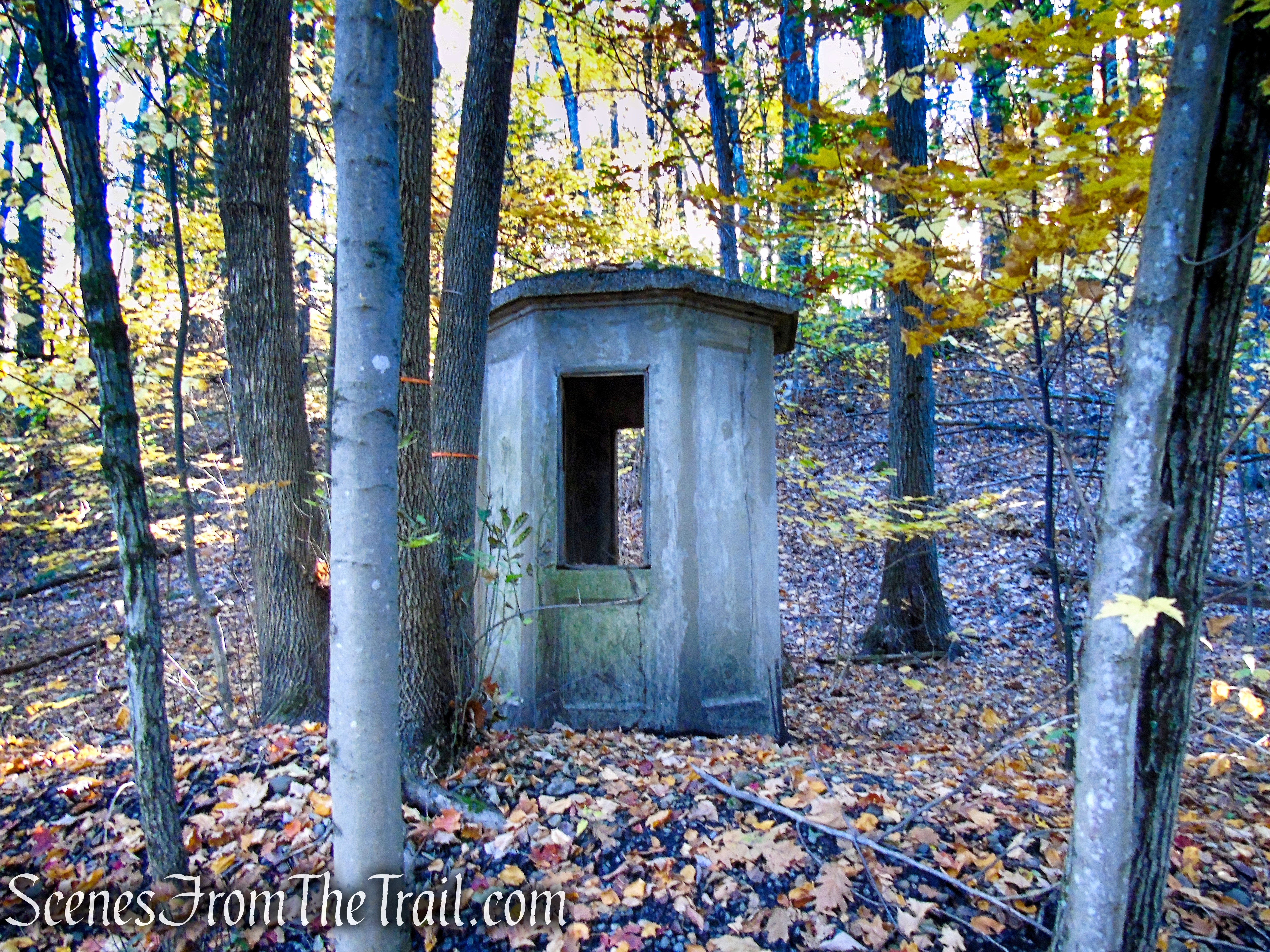 Abandoned railbed - concrete telephone booth